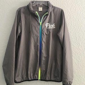 Pink Victoria’s Secret hooded wind breaker.
